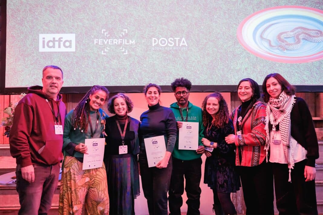 A group of winners and jurors from the